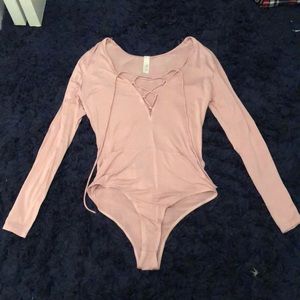 Light pink body suit